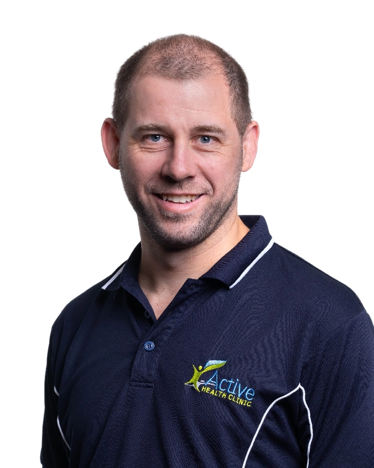 Nathan Butler, creator of Active Health Clinic's Hypermobility & EDS Program - smiling at the camera