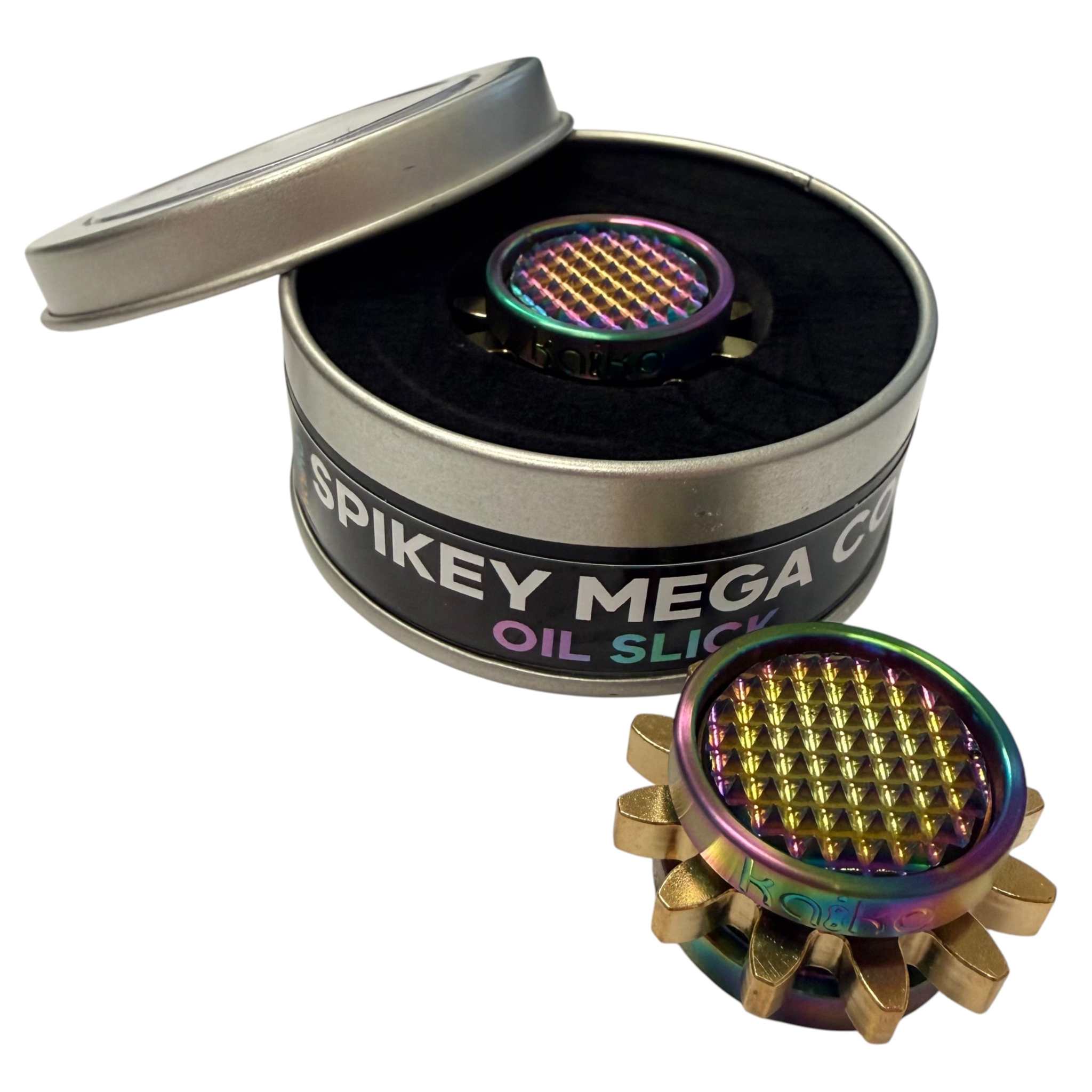 Spikey Mega Cog held between two fingers, showing its size against a hand
