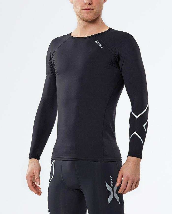 Long sleeve black compression top with thermal fabric for warmth and muscle support, featuring antibacterial and anti-odor technology.