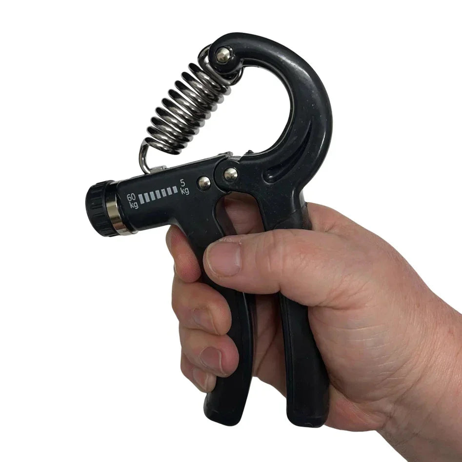 Hand grip strengthener held in hand, part of a fidget kit for managing intense emotions and improving hand dexterity