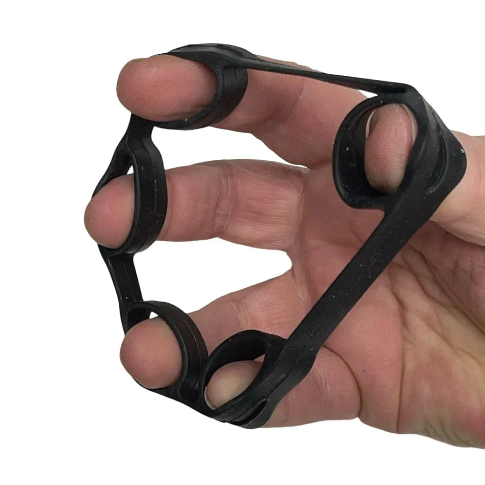 Hand wearing black stretch finger grip for resistance and finger extension in fidget kit