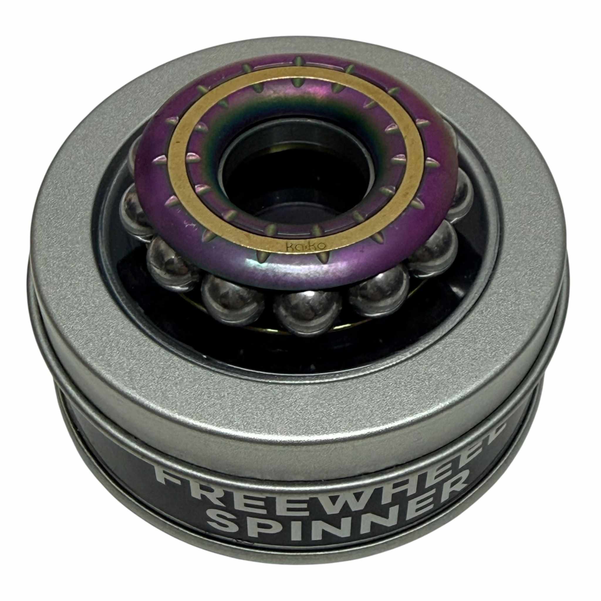 Freewheel spinner sitting in its open metal window tin