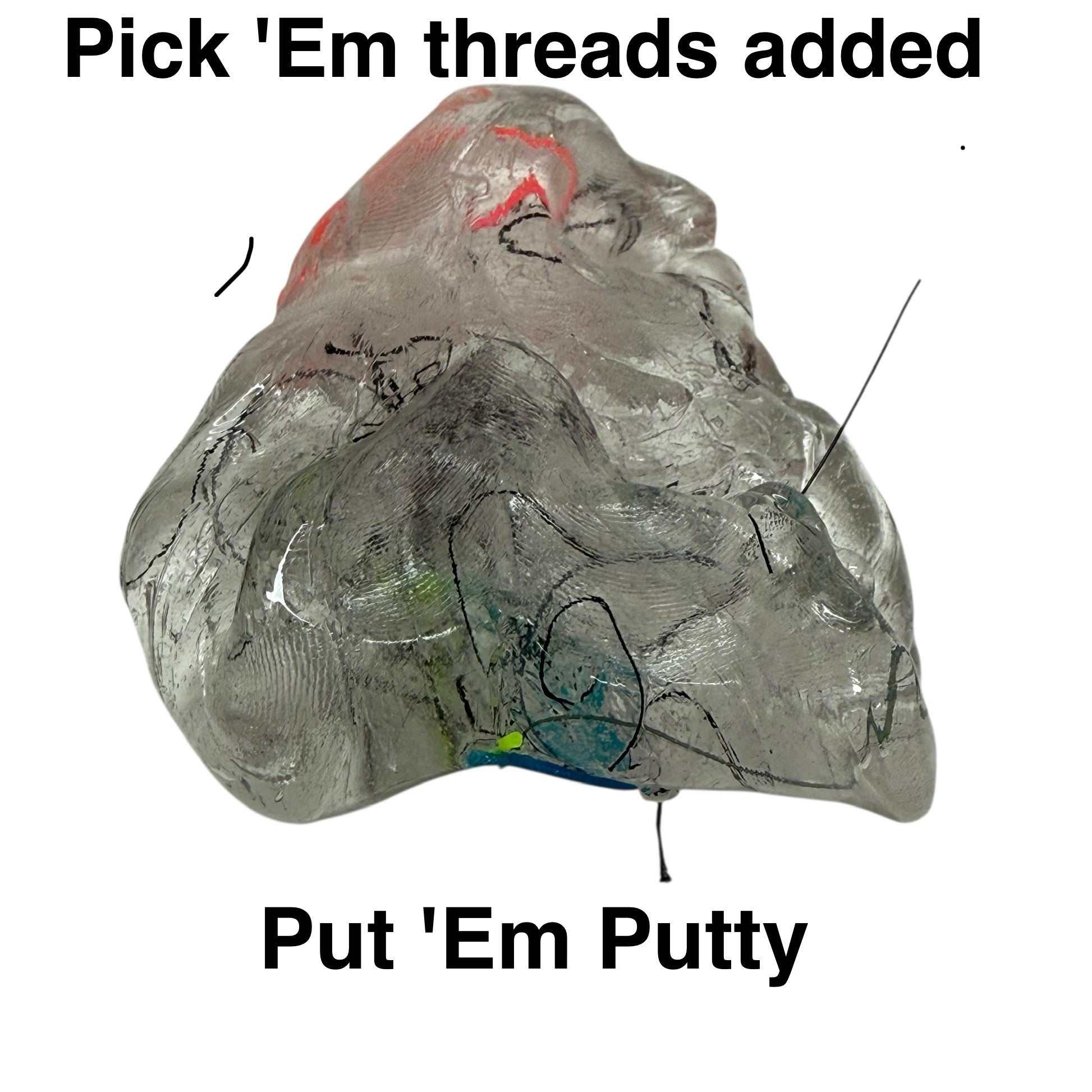 Coloured threads pressed into clear putty